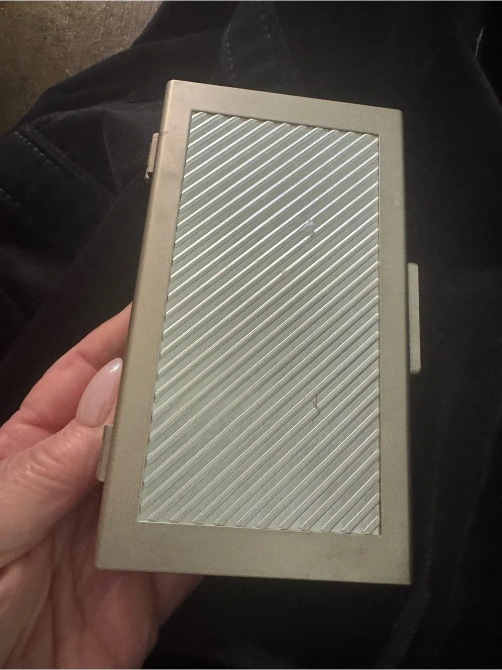 Source Unknown compact grooming